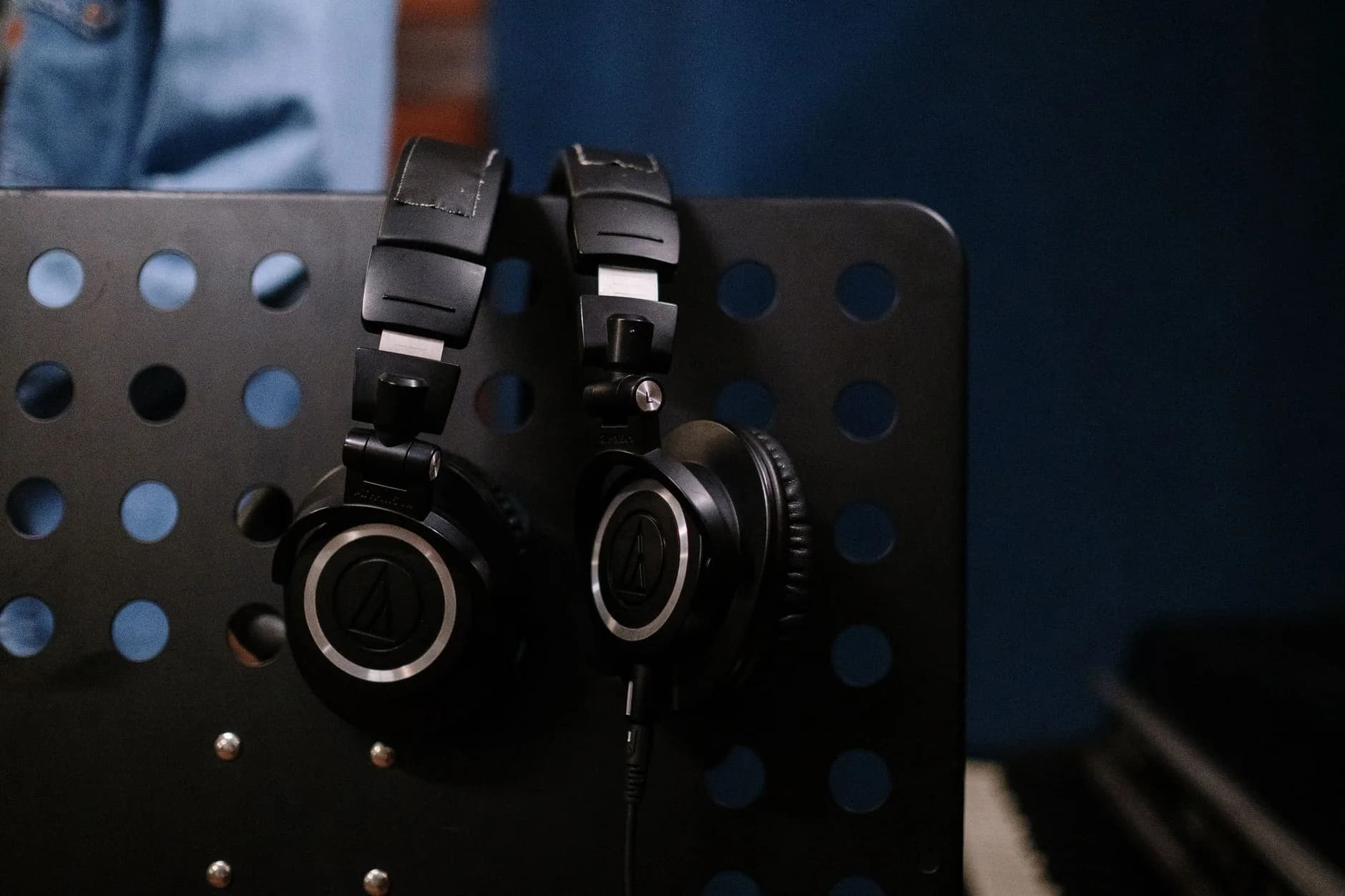 Headphones in a dark room