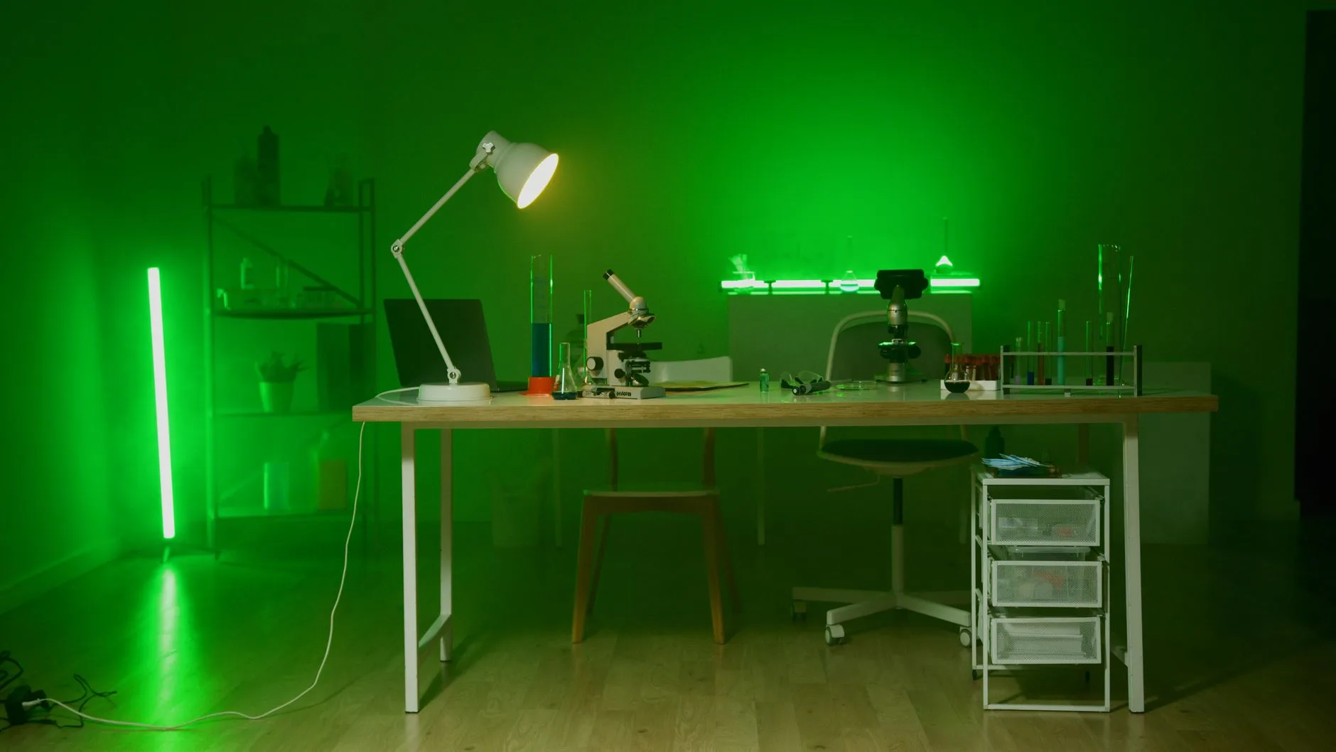 A notebook under a desk lamp