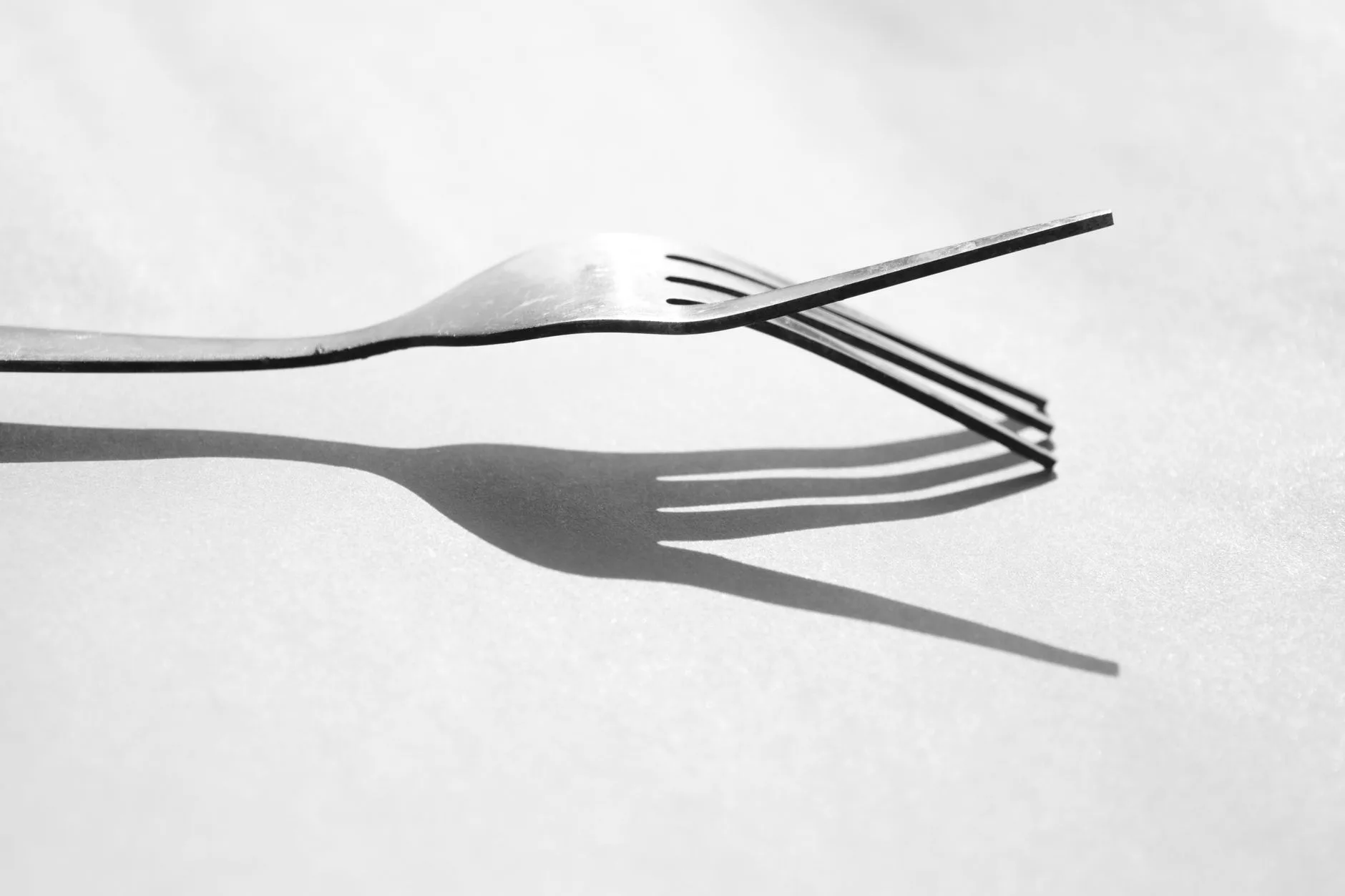 A bent metal spoon