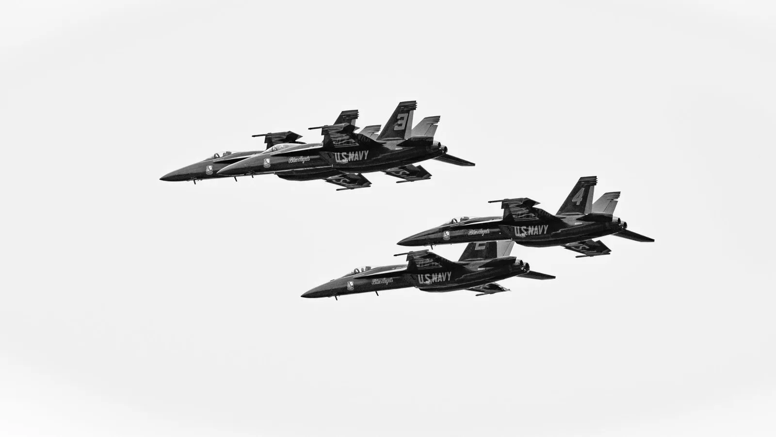 A dark angular military aircraft