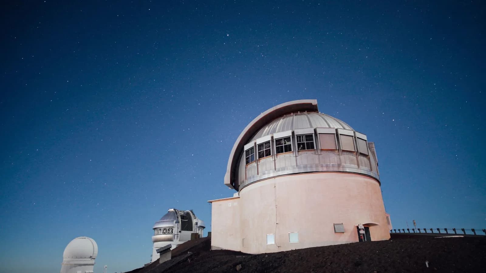 An observatory dome at night