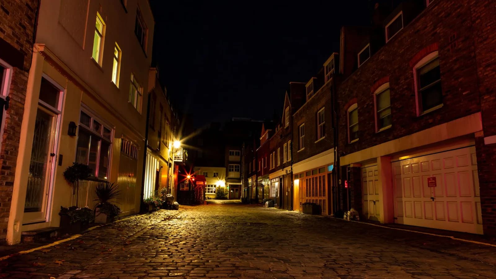 A Victorian London street at night