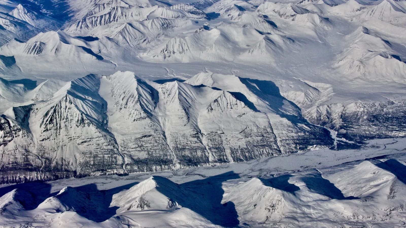 Snow-covered Alaskan terrain from the air