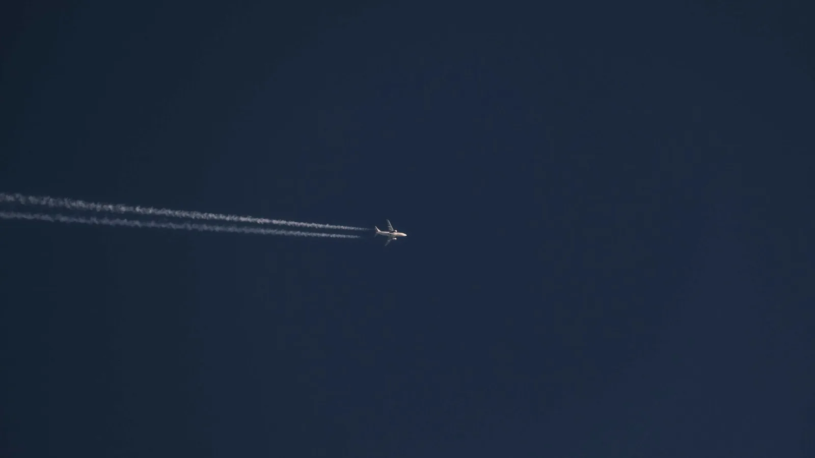 An aircraft contrail at high altitude