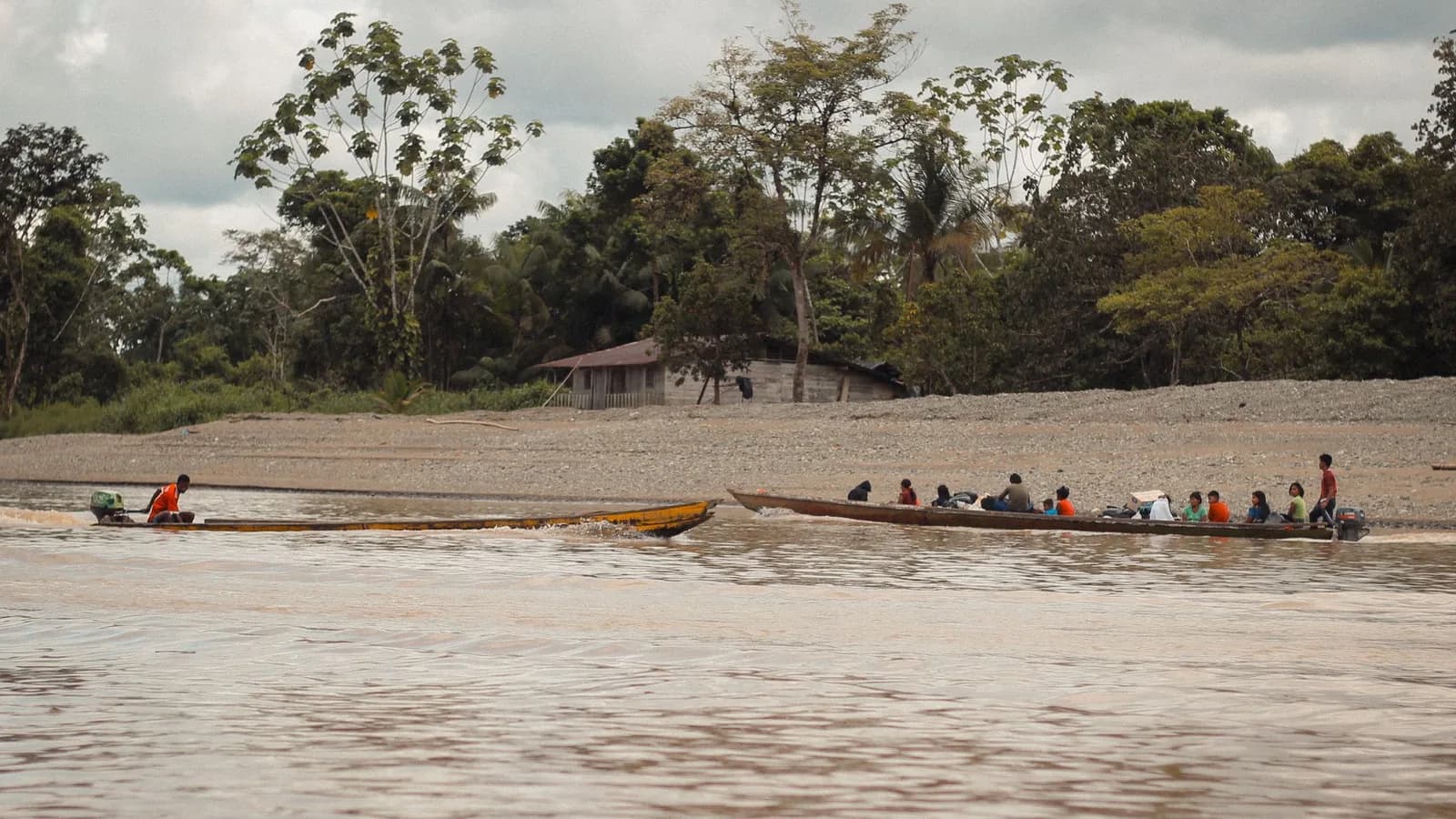 A river settlement at the edge of jungle